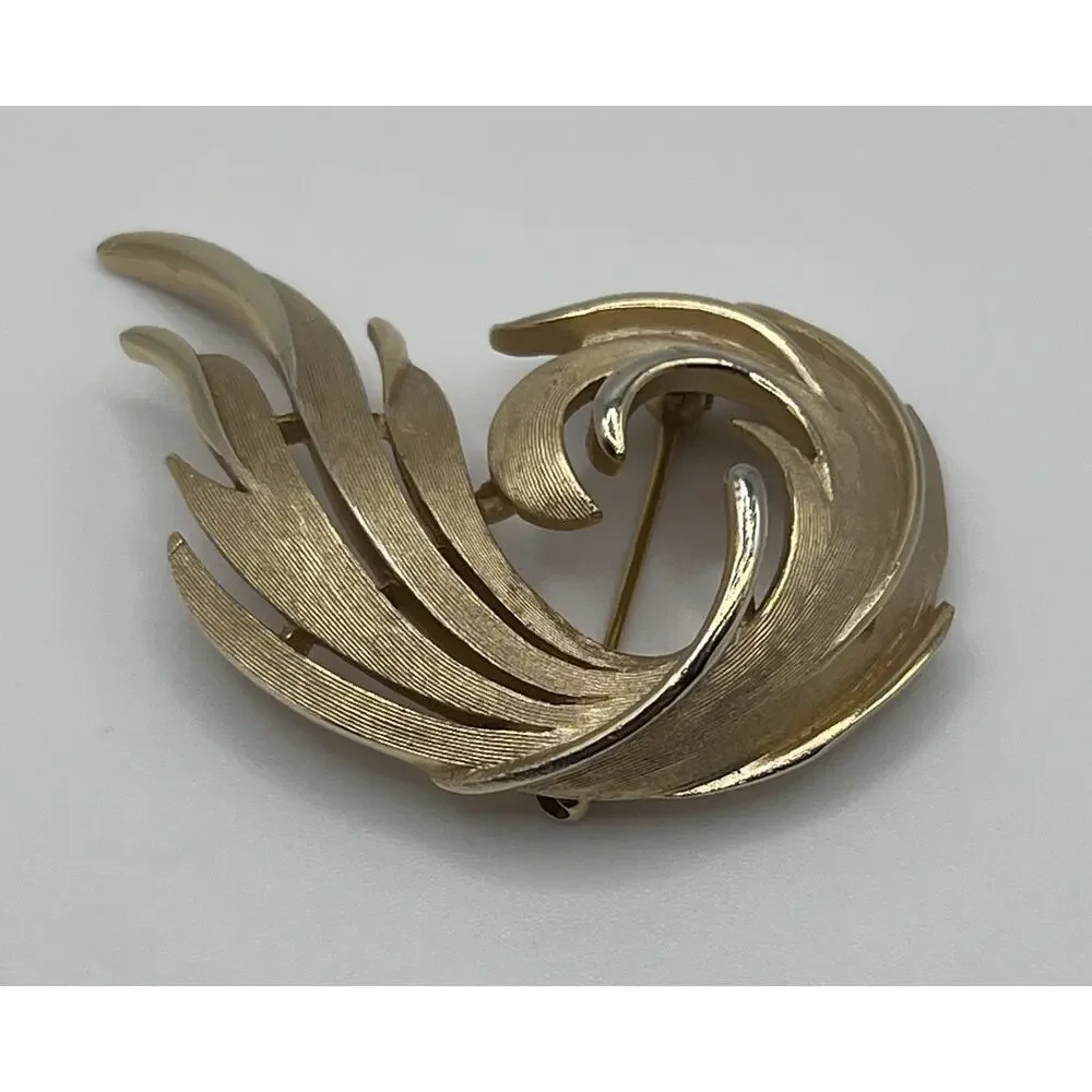 Vintage Crown Trifari Classic Textured Gold Tone Open Swirl Costume Brooch